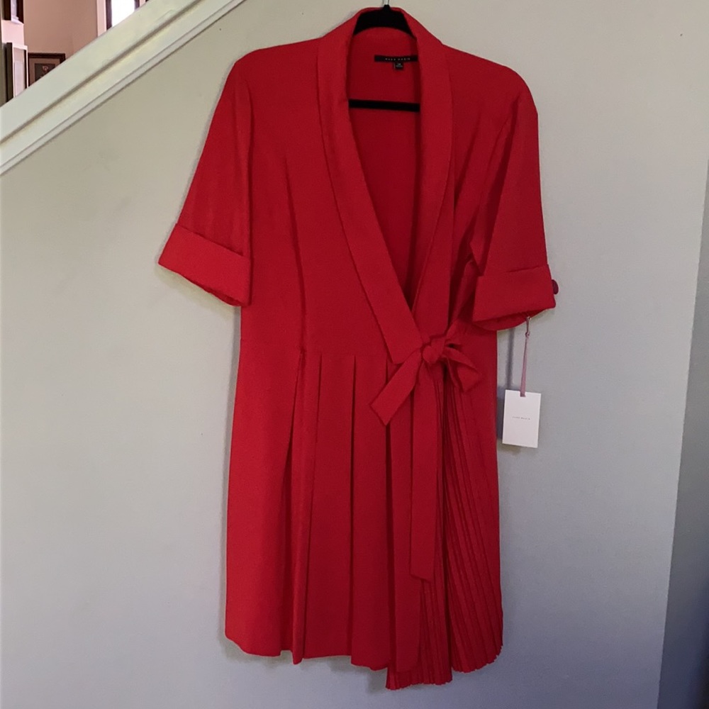 Alex Marie
Arielle Short Sleeve V-Neck Tie Front Romper Dress. - Picture 2 of 12